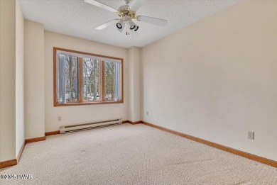 Stunning Cedar Chalet on the 15th Fairway of Paupack Hills in on Paupack Hills Golf and Country Club in Pennsylvania - for sale on GolfHomes.com, golf home, golf lot