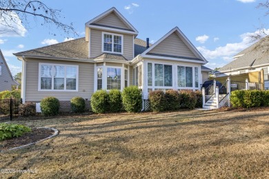 Discover the epitome of comfort and style in this stunning on Carolina National Golf Club in North Carolina - for sale on GolfHomes.com, golf home, golf lot