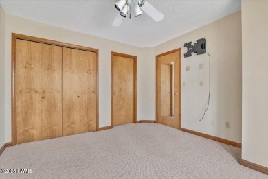 Stunning Cedar Chalet on the 15th Fairway of Paupack Hills in on Paupack Hills Golf and Country Club in Pennsylvania - for sale on GolfHomes.com, golf home, golf lot