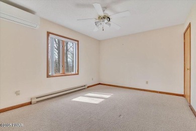 Stunning Cedar Chalet on the 15th Fairway of Paupack Hills in on Paupack Hills Golf and Country Club in Pennsylvania - for sale on GolfHomes.com, golf home, golf lot
