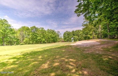 Stunning Cedar Chalet on the 15th Fairway of Paupack Hills in on Paupack Hills Golf and Country Club in Pennsylvania - for sale on GolfHomes.com, golf home, golf lot