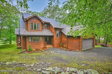 Stunning Cedar Chalet on the 15th Fairway of Paupack Hills in on Paupack Hills Golf and Country Club in Pennsylvania - for sale on GolfHomes.com, golf home, golf lot
