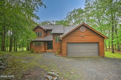 Stunning Cedar Chalet on the 15th Fairway of Paupack Hills in on Paupack Hills Golf and Country Club in Pennsylvania - for sale on GolfHomes.com, golf home, golf lot