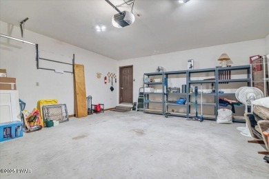 Stunning Cedar Chalet on the 15th Fairway of Paupack Hills in on Paupack Hills Golf and Country Club in Pennsylvania - for sale on GolfHomes.com, golf home, golf lot