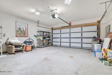 Stunning Cedar Chalet on the 15th Fairway of Paupack Hills in on Paupack Hills Golf and Country Club in Pennsylvania - for sale on GolfHomes.com, golf home, golf lot