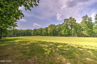 Stunning Cedar Chalet on the 15th Fairway of Paupack Hills in on Paupack Hills Golf and Country Club in Pennsylvania - for sale on GolfHomes.com, golf home, golf lot