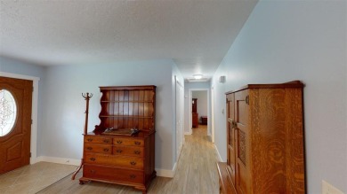 Located in one of Cody's favorite neighborhoods is this on Olive Glenn Golf and Country Club in Wyoming - for sale on GolfHomes.com, golf home, golf lot