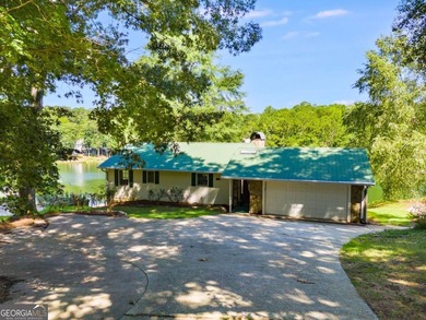 Wake up to sparkling lake views every day in this beautiful 3 on Fairfield Plantation Golf and Country Club in Georgia - for sale on GolfHomes.com, golf home, golf lot