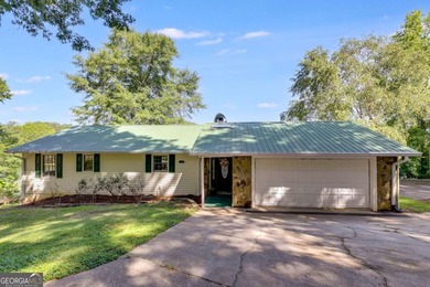 Wake up to sparkling lake views every day in this beautiful 3 on Fairfield Plantation Golf and Country Club in Georgia - for sale on GolfHomes.com, golf home, golf lot
