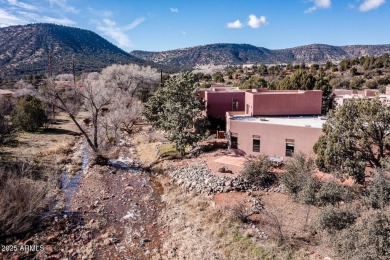 Stunning single-level 3 bed, 2.5 bath Sedona home with on Canyon Mesa Country Club in Arizona - for sale on GolfHomes.com, golf home, golf lot