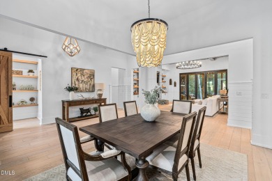 Elegant Modern Style home with views of a forested backyard and on The Preserve At Jordan Lake Golf Club in North Carolina - for sale on GolfHomes.com, golf home, golf lot