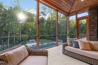 Elegant Modern Style home with views of a forested backyard and on The Preserve At Jordan Lake Golf Club in North Carolina - for sale on GolfHomes.com, golf home, golf lot