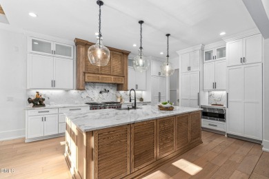 Elegant Modern Style home with views of a forested backyard and on The Preserve At Jordan Lake Golf Club in North Carolina - for sale on GolfHomes.com, golf home, golf lot