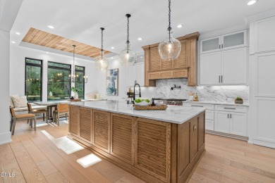 Elegant Modern Style home with views of a forested backyard and on The Preserve At Jordan Lake Golf Club in North Carolina - for sale on GolfHomes.com, golf home, golf lot