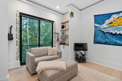 Elegant Modern Style home with views of a forested backyard and on The Preserve At Jordan Lake Golf Club in North Carolina - for sale on GolfHomes.com, golf home, golf lot
