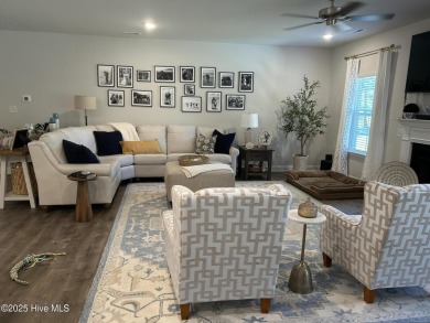 This home was built in 2024; it's practically brand new! The on Harbour Point Golf Club in North Carolina - for sale on GolfHomes.com, golf home, golf lot