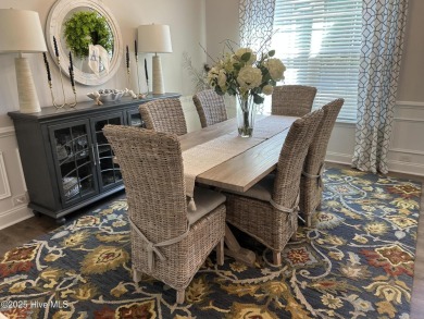 This home was built in 2024; it's practically brand new! The on Harbour Point Golf Club in North Carolina - for sale on GolfHomes.com, golf home, golf lot