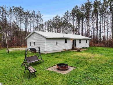 Discover your Northern Michigan dream property! This charming on Stoney Creek Golf Course in Michigan - for sale on GolfHomes.com, golf home, golf lot