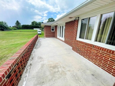 Nestled in an established neighborhood near the Wytheville golf on Wytheville Golf Club, Inc. in Virginia - for sale on GolfHomes.com, golf home, golf lot