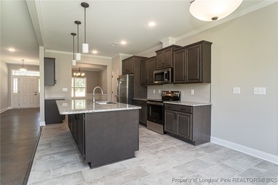 Located in a Gated, golf community with top-rated Jack Britt on Gates Four Golf and Country Club in North Carolina - for sale on GolfHomes.com, golf home, golf lot