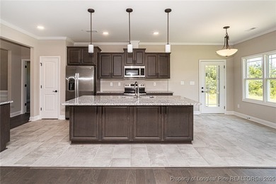 Located in a Gated, golf community with top-rated Jack Britt on Gates Four Golf and Country Club in North Carolina - for sale on GolfHomes.com, golf home, golf lot