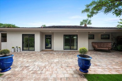 Meticulously renovated 3BR/3BA main home plus detached 1BR/1BA on Palm Beach Polo and Country Club in Florida - for sale on GolfHomes.com, golf home, golf lot