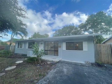 Charming 3 bedrooms, 2 baths home with a versatile den in on Pompano Beach Golf Course  in Florida - for sale on GolfHomes.com, golf home, golf lot