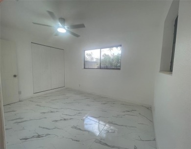 Charming 3 bedrooms, 2 baths home with a versatile den in on Pompano Beach Golf Course  in Florida - for sale on GolfHomes.com, golf home, golf lot