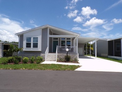 2021 Palm Harbor  "Summer Breeze " home, meticulously on Schalamar Creek Golf and Country Club in Florida - for sale on GolfHomes.com, golf home, golf lot