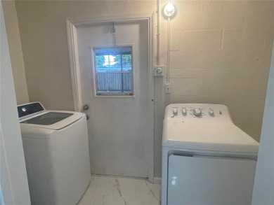 Charming 3 bedrooms, 2 baths home with a versatile den in on Pompano Beach Golf Course  in Florida - for sale on GolfHomes.com, golf home, golf lot