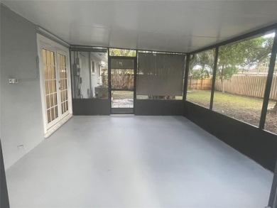 Charming 3 bedrooms, 2 baths home with a versatile den in on Pompano Beach Golf Course  in Florida - for sale on GolfHomes.com, golf home, golf lot