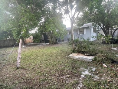 Charming 3 bedrooms, 2 baths home with a versatile den in on Pompano Beach Golf Course  in Florida - for sale on GolfHomes.com, golf home, golf lot