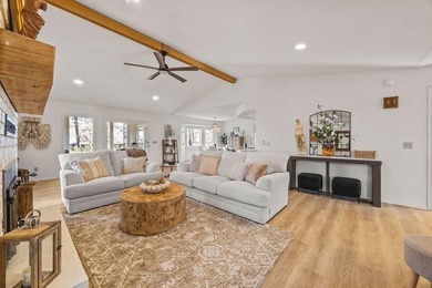 Tucked in Dunvegan near Loch Lomond, this refreshed single-level on Bella Vista Country Club - Scottsdale in Arkansas - for sale on GolfHomes.com, golf home, golf lot