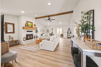 Tucked in Dunvegan near Loch Lomond, this refreshed single-level on Bella Vista Country Club - Scottsdale in Arkansas - for sale on GolfHomes.com, golf home, golf lot