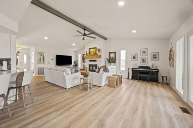 Tucked in Dunvegan near Loch Lomond, this refreshed single-level on Bella Vista Country Club - Scottsdale in Arkansas - for sale on GolfHomes.com, golf home, golf lot