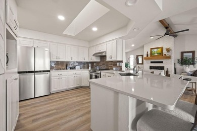 Tucked in Dunvegan near Loch Lomond, this refreshed single-level on Bella Vista Country Club - Scottsdale in Arkansas - for sale on GolfHomes.com, golf home, golf lot