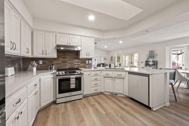 Tucked in Dunvegan near Loch Lomond, this refreshed single-level on Bella Vista Country Club - Scottsdale in Arkansas - for sale on GolfHomes.com, golf home, golf lot