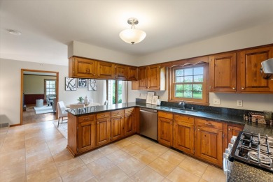 Welcome to this charming and spacious home nestled on nearly an on North Shore Country Club in Wisconsin - for sale on GolfHomes.com, golf home, golf lot