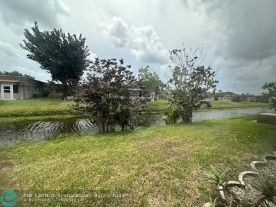 Sought after corner 1/1.5 villa on canal. Your new home features on Kings Point Golf -Flanders Way in Florida - for sale on GolfHomes.com, golf home, golf lot
