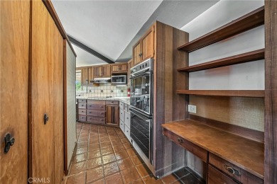 Great house with vaulted round wood ceiling, windows seem newer on The Riviera Hills Golf and Country Club in California - for sale on GolfHomes.com, golf home, golf lot