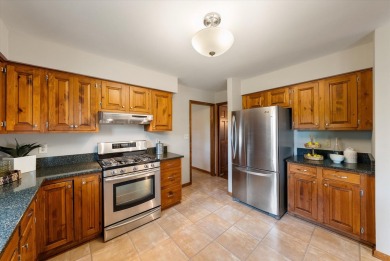 Welcome to this charming and spacious home nestled on nearly an on North Shore Country Club in Wisconsin - for sale on GolfHomes.com, golf home, golf lot