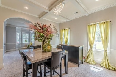 Discover this beautifully designed 4-sided brick home tucked on Crystal Lake Golf and Country Club in Georgia - for sale on GolfHomes.com, golf home, golf lot