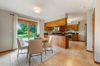 Welcome to this charming and spacious home nestled on nearly an on North Shore Country Club in Wisconsin - for sale on GolfHomes.com, golf home, golf lot