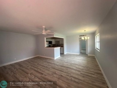 Sought after corner 1/1.5 villa on canal. Your new home features on Kings Point Golf -Flanders Way in Florida - for sale on GolfHomes.com, golf home, golf lot