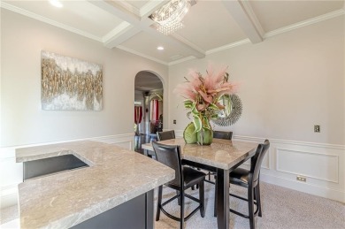 Discover this beautifully designed 4-sided brick home tucked on Crystal Lake Golf and Country Club in Georgia - for sale on GolfHomes.com, golf home, golf lot