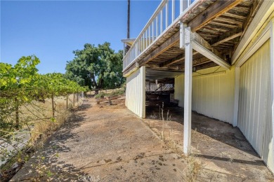 Great house with vaulted round wood ceiling, windows seem newer on The Riviera Hills Golf and Country Club in California - for sale on GolfHomes.com, golf home, golf lot