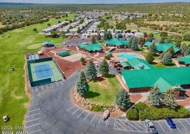 This home is situated in Juniper Ridge Resort (JRR) a 55+ adult on Juniper Ridge R.V. Golf Resort in Arizona - for sale on GolfHomes.com, golf home, golf lot