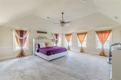 Discover this beautifully designed 4-sided brick home tucked on Crystal Lake Golf and Country Club in Georgia - for sale on GolfHomes.com, golf home, golf lot