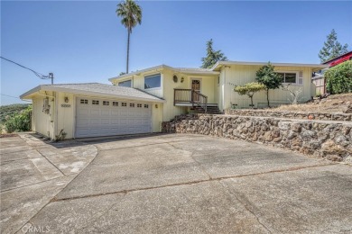 Great house with vaulted round wood ceiling, windows seem newer on The Riviera Hills Golf and Country Club in California - for sale on GolfHomes.com, golf home, golf lot
