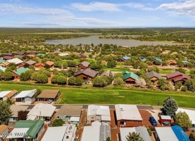 This home is situated in Juniper Ridge Resort (JRR) a 55+ adult on Juniper Ridge R.V. Golf Resort in Arizona - for sale on GolfHomes.com, golf home, golf lot